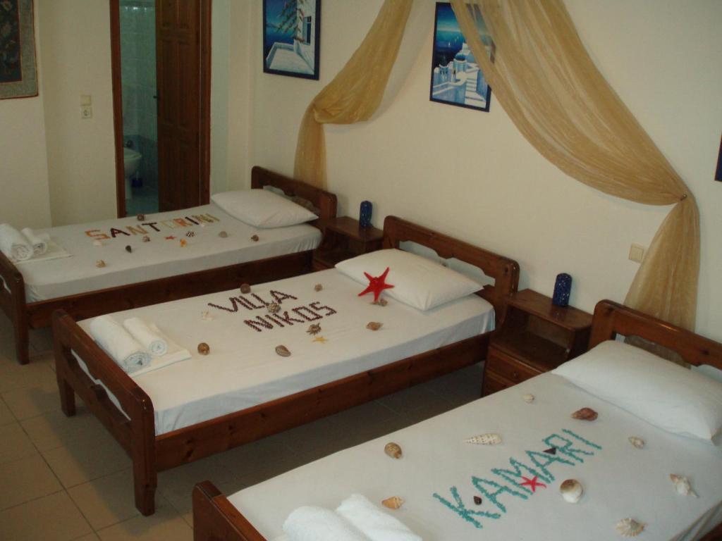 Villa Nikos Karamolegkos Kamari Rum bild